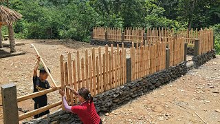 The process of mother and son building a wood stove and fence, made of cement | farm building