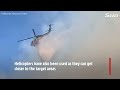 incredible compilation shows brave pilots fight la wildfires with planes swooping feet above ground