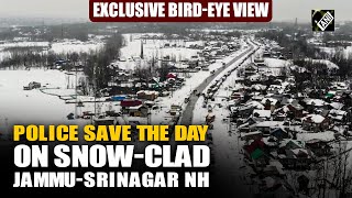 Snow blankets Jammu-Srinagar National Highway; Police step in to aid commuters on snow-clad highway