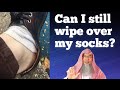 Can I continue to wipe on the socks if part of my foot became exposed while taking shoes off? Assim