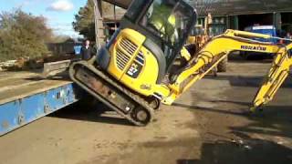 Loading a digger sideways onto a truck FAIL