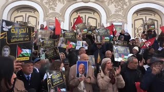 Tunisians rally on revolution anniversary, demand freedoms and release of political prisoners