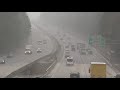 snow falls over i 40 in cary