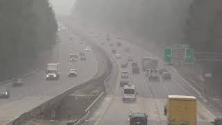 Snow falls over I-40 in Cary