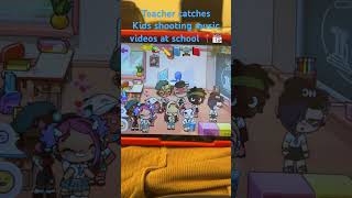 Teacher catches kids shooting music video at school