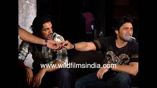 Arshad Warsi and John Abraham relax before our interview , Arshad lights up and smokes, John yawns