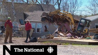 Flood forces couple to demolish retirement home