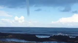 A resident spotted a waterspout spinning along the coast of Zuwara, Libya.