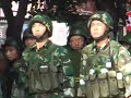 chinese troops flood into restive urumqi