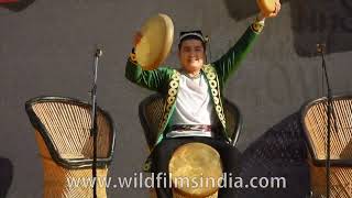 Uzbek man plays 3 drums at once! Percussive showmanship from Uzbekistan drumming maestro