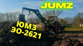 Soviet excavator moving rocks and dirt / JUMZ ЮМЗ ЭО-2621