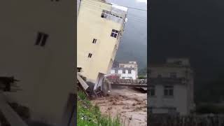 FIVE-STOREY BUILDING COLLAPSES DUE TO FLOODING