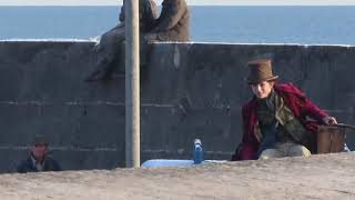 Timothée Chalamet filming a scene as Willy Wonka in Lyme Regis