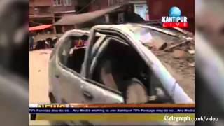 Nepal earthquake: car crushed by rubble a car