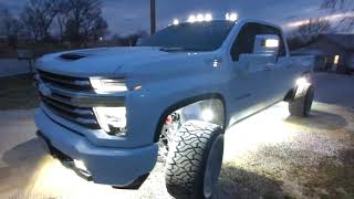 30 Rock Lights On A Leveled 2022 High Country Duramax with 24x14s!