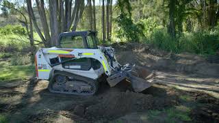 Purpose of 4-in-1 Bucket on a Skid Steer Loader