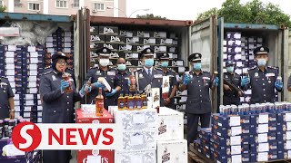 Customs foils bid to smuggle liquor worth RM2.6mil in nine containers