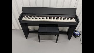 Roland F120R compact slim size Digital Piano and stool in black stock # 24279