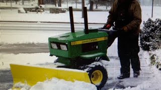 John Deere snowblower conversion to plow and articulating tractor.