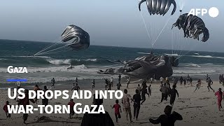US drops aid into war-torn Gaza | AFP