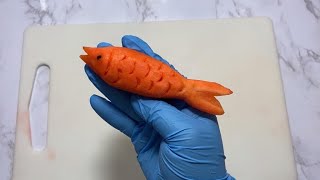 Beautiful carrot fish.vegetables carving garnish.carrot design