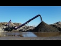 tc 421 tracked conveyor stockpiling aggregates.