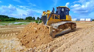 The best SHANTUi Bulldozer Operator Expert pushing soil clearing land for building apartment project