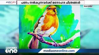 കോവിഡ് വാക്സിനുള്ള പണം നല്‍കുന്നവർക്ക് ചിത്രങ്ങള്‍ വരച്ചു നല്‍കി ശ്രദ്ധേയമായി ഒരു പോലീസുകാരന്‍