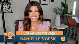 Do you need to redeem a certain number of tokens to win a prize?