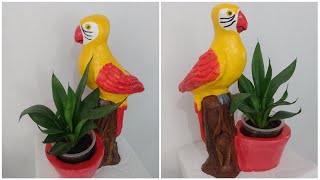 Vaso papagaio no tronco, de cimento | Vaso pássaro no tronco de cimento, para plantas pequenas.