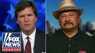 Tucker takes on a migrant caravan supporter