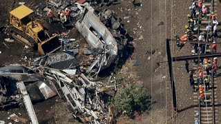 Feds: Amtrak engineer distracted prior to derailment