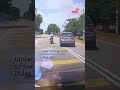 Motorcyclist in Malaysia suddenly swerves lane