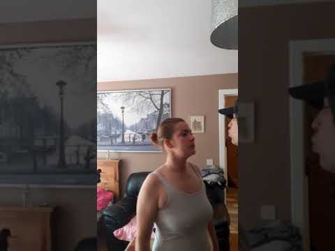 Why does my dog bark at my husband when he hugs me?