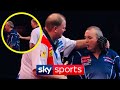 Watch the SHOCKING moment Phil Taylor CLASHES with Raymond Van Barneveld!