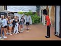 Windsor Castle guard shouts at Disrespectful tourist's get off the rope #windsorcastle