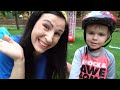 mom teaches lika and andrew how to ride a bike