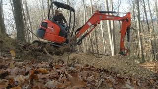 Digging a level ditch on a slope with the Kubota 33-4