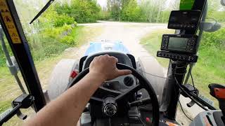 Driving New Holland T6050