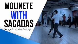 Basic sacadas in the molinete.  Intermediate tango class with George and Jairelbhi Furlong.