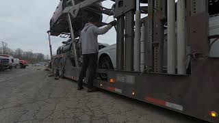 Loading a broken Ferrari on a car hauler