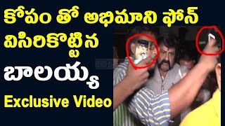 Balakrishna throws fan phone at Gautamiputra Satakarni Premier | Balayya true behavior in public