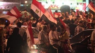 Supporters celebrate as Egypt's Sisi wins overwhelming majority