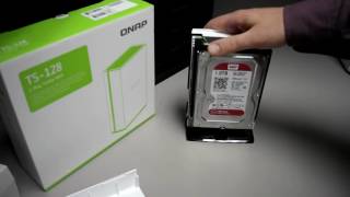 Putting together the QNAP TS-128 network storage device