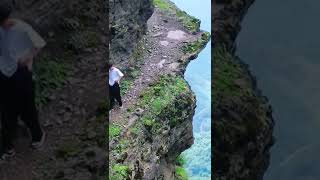 The sidewalk on the Cliff | Hanging Wall Do you dare to walk this cliff road #sidewalk  #shorts