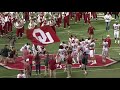 baker mayfield plants oklahoma flag following win vs. ohio state b1g football