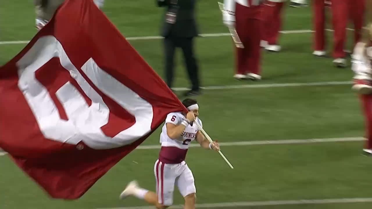 Baker Mayfield Plants Oklahoma Flag Following Win Vs. Ohio State | B1G ...