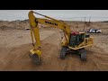 from desert to solar farm building the future with komatsu pc225lc excavator in xinjiang china