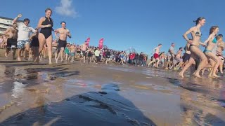 Hundreds jump into the ocean on New Year's Day for 35th annual Lobster Dip