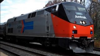 Amtrak heritage unit 156 leading through Crystal city